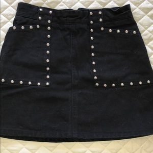Black denim UO mini skirt with studded pockets